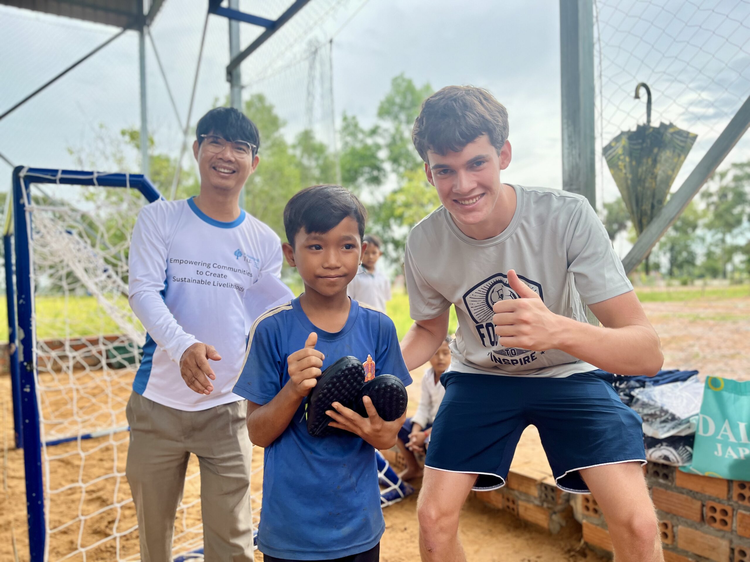 Enhancing Student Development through Sports: Malcolm Hand’s Endeavors in Cambodia